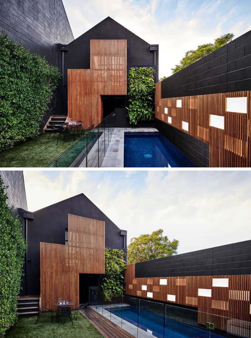 Swimming Pool Ideas - Feature light panels in the accent wall reflect the timber cabinetry within the house, with some of the light panels in the wall exposed, while others are partially hidden behind timber battens, creating a playful element to the space and reflecting on the pool water in the evening. #SwimmingPoolIdeas #PoolIdeas #GardenIdeas #LnadscapingIdeas #ModernPool