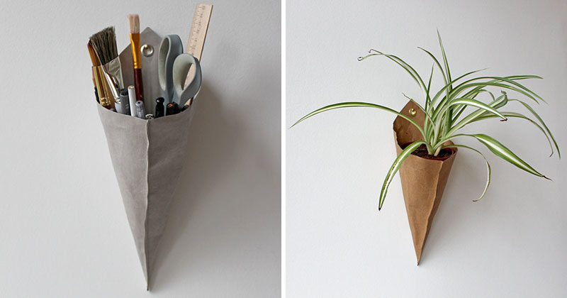 Wall Decor Idea - These modern cone-shaped wall planters and storage pieces are made from a material that looks like paper. #ModernDecor #WallDecorIdeas #ModernWallPlanters #StorageIdeas #WallStorage