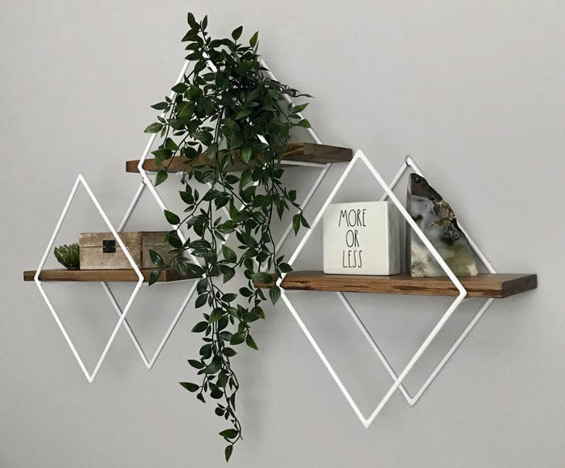 Wall Shelf Ideas - These modern geometric wall shelves, which have been designed in a variety of sizes and layouts, are made with steel frames, available in a variety of finishes, and are adorned with wood shelving to add a natural element. #WallShelf #WallDecor #ShelvingIdeas #ModernShelving #ModernShelf #Design