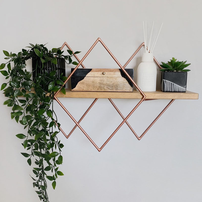 Wall Shelf Ideas - These modern geometric wall shelves, which have been designed in a variety of sizes and layouts, are made with steel frames, available in a variety of finishes, and are adorned with wood shelving to add a natural element. #WallShelf #WallDecor #ShelvingIdeas #ModernShelving #ModernShelf #Design