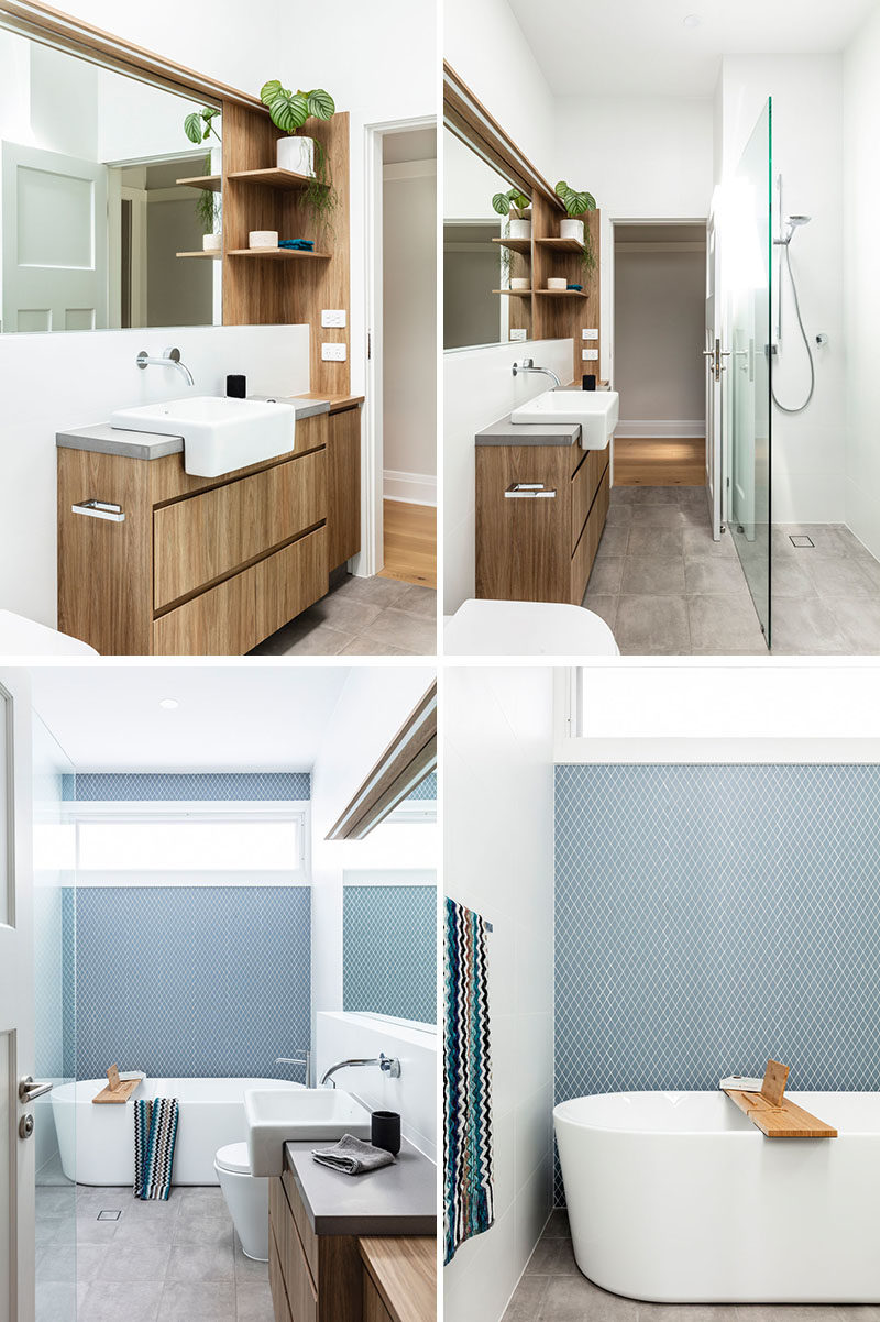 Bathroom Ideas - This bathroom combines a wood vanity and a blue-grey tile accent wall for modern appearance. #ModernBathroom #WoodVanity #AccentWall #BathroomIdeas