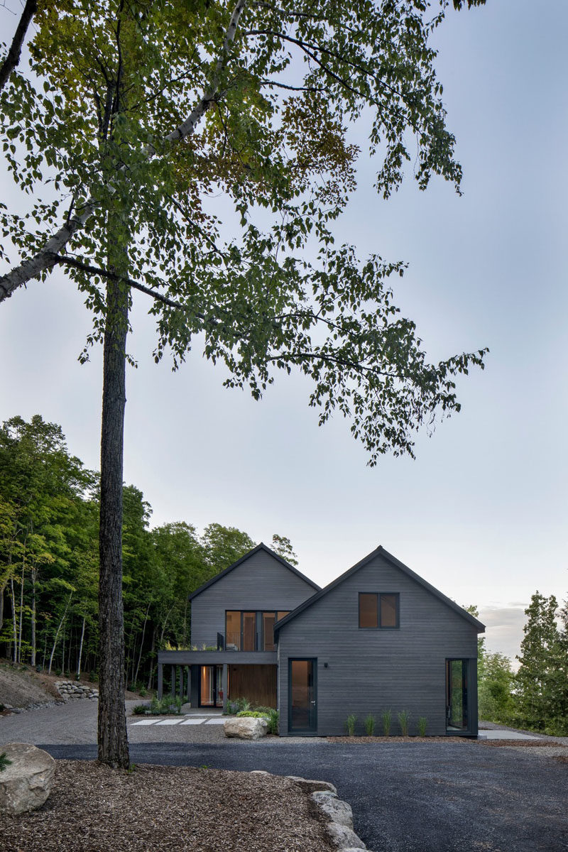 Modern Barnhouse Ideas - This modern barnhouse is designed as two separate areas, the first, a combined guest loft, garage and artist studio, that's connected by a glass tunnel to the second, the main house. #ModernBarnhouse #ModernArchitecture #BarnhouseDesign