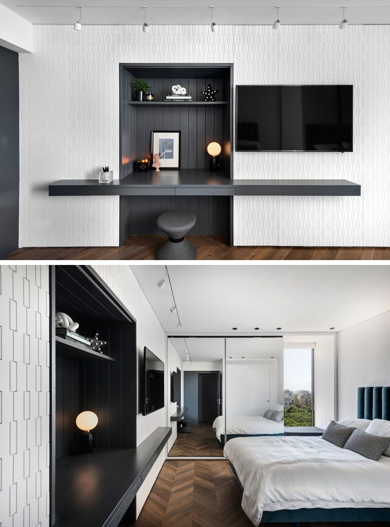 In this modern bedroom, there's an alcove with shelving and a built-in desk that provides a place to study, while a window seat overlooks the tree and city views outside. #ModernBedroom #Desk #BuiltInDesk #BedroomDesign #WindowSeat