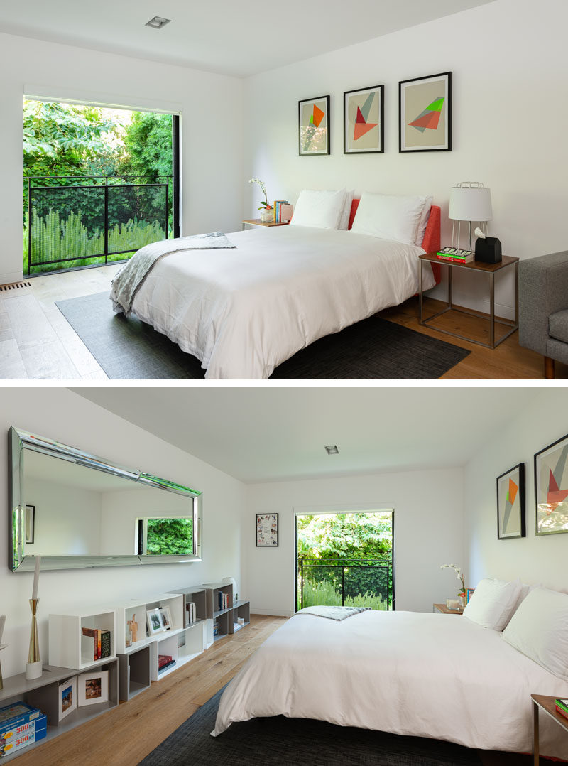 This modern bedroom has sliding doors that open to views of the garden. #ModernBedroom #BedroomDesign #SlidingDoors
