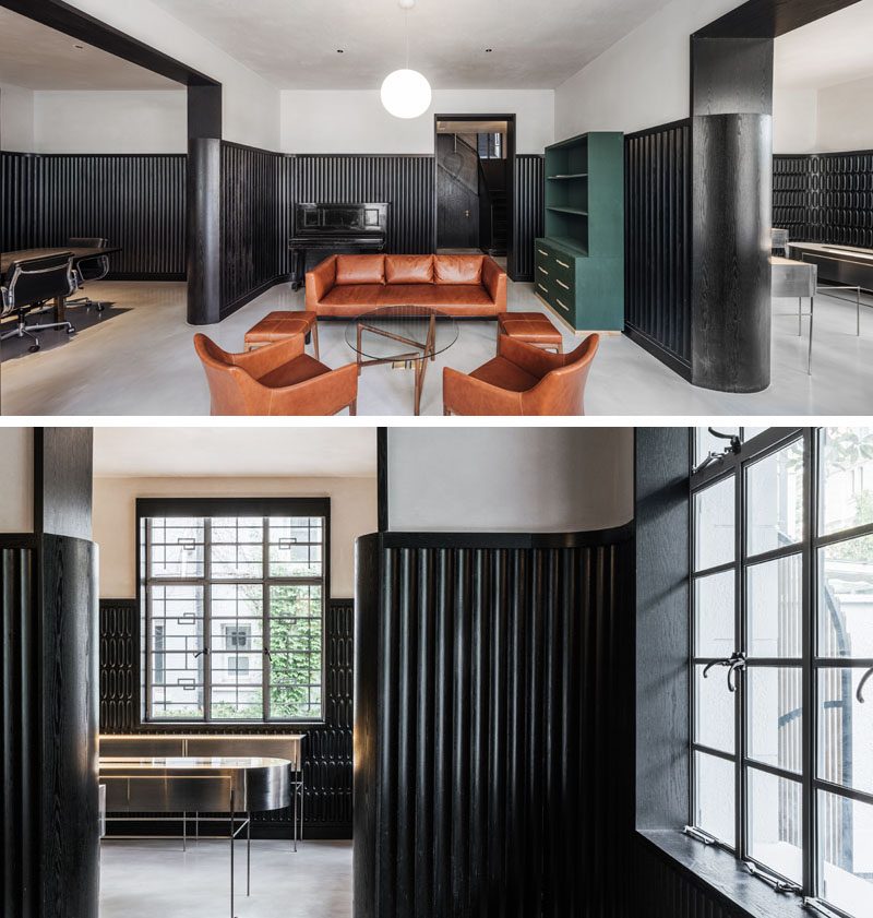 A dramatic design accent was created in this modern house, by adding black wainscoting that covers two thirds of the walls. #ModernInterior #BlackWainscoting #InteriorDesign #Interiors #BlackTexturedWalls