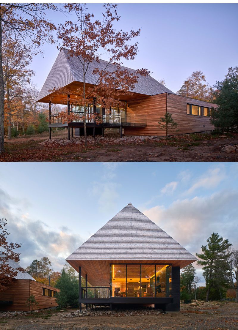This collection of modern cabins are clad in shiplapped wood, which adjoins a glass pavilion that holds an open-plan living and dining space. They also have a deep hip roof that's clad with cedar shingles. #ModernCabin #Architecture #CabinDesign