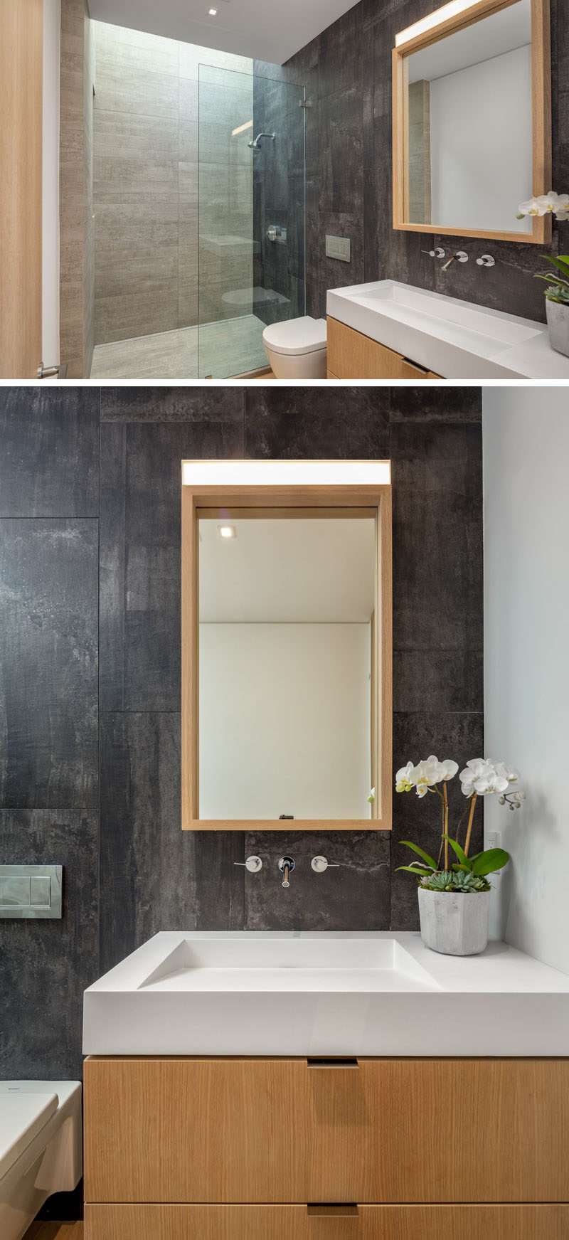 Bathroom Ideas - In this modern bathroom, a skylight adds natural light to the shower, and a wood vanity with matching mirror adds a natural touch. #BathroomIdeas #ModernBathroom #WoodVanity