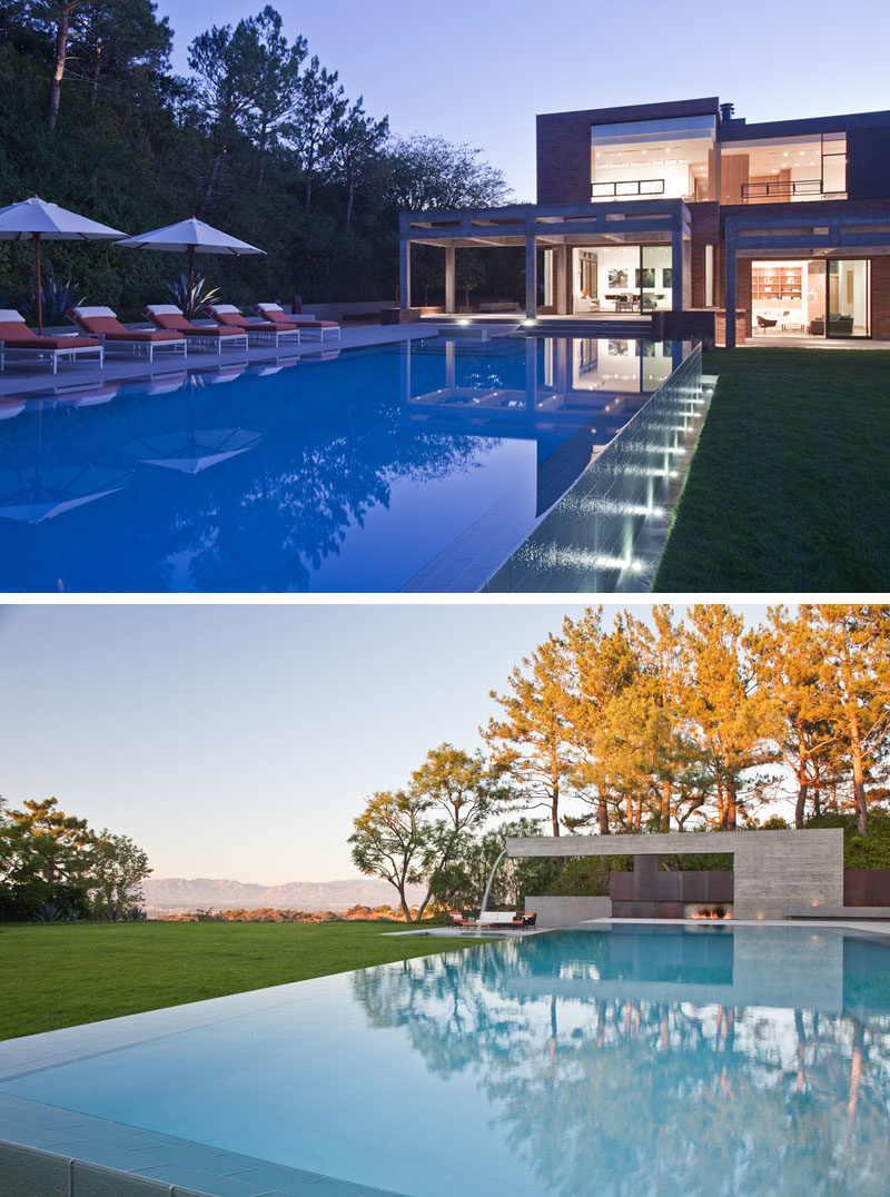 Swimming Pool Ideas - This modern house has an Olympic-sized infinity-edge pool and a Barragan inspired poured-in-place cantilevered concrete water fountain. #SwimmingPoolIdeas #Landscaping #PoolIdeas #InfinityEdgePool #Fountain