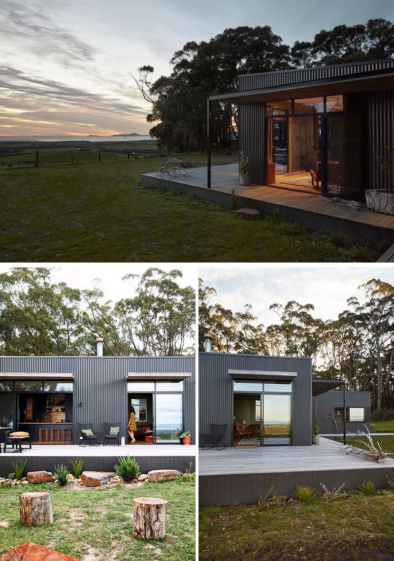 This modern Australian house features partially a covered porch, that's covered in Woodland Grey Colorbond cladding, timber, and natural materials and colors throughout the project. #ModernArchitecture #HouseDesign #Porch