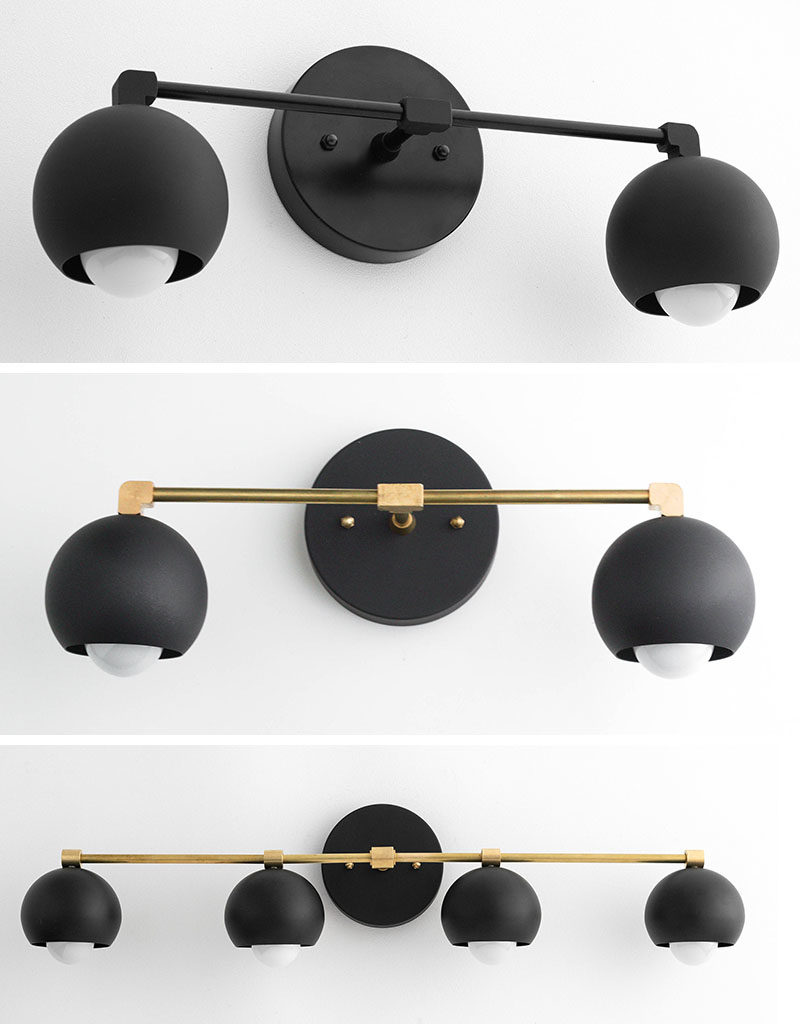 Modern Lighting Ideas - Drawing inspiration from mid-century lighting, this matte black modern lighting collection includes pendant lights, vanity lights, and table lamps, and has orb-shaped shades. #LightingIdeas #ModernLighting #MatteBlackLighting #MidCenturyLighting