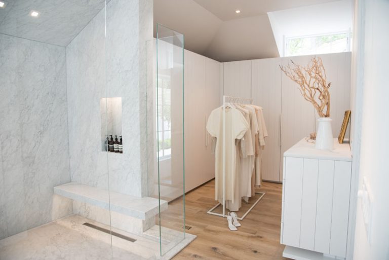 this-bathroom-and-walk-in-closet-combination-are-fully-open-to-the-room
