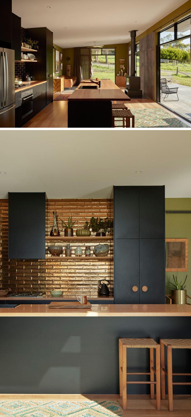 Sliding doors that fill the interior of this modern house with natural light and open the interior to the porch, creating indoor/outdoor living experience, while a metallic backsplash brightens up matte black kitchen cabinets. #ModernInterior #BlackKitchen #MetallicBacksplash