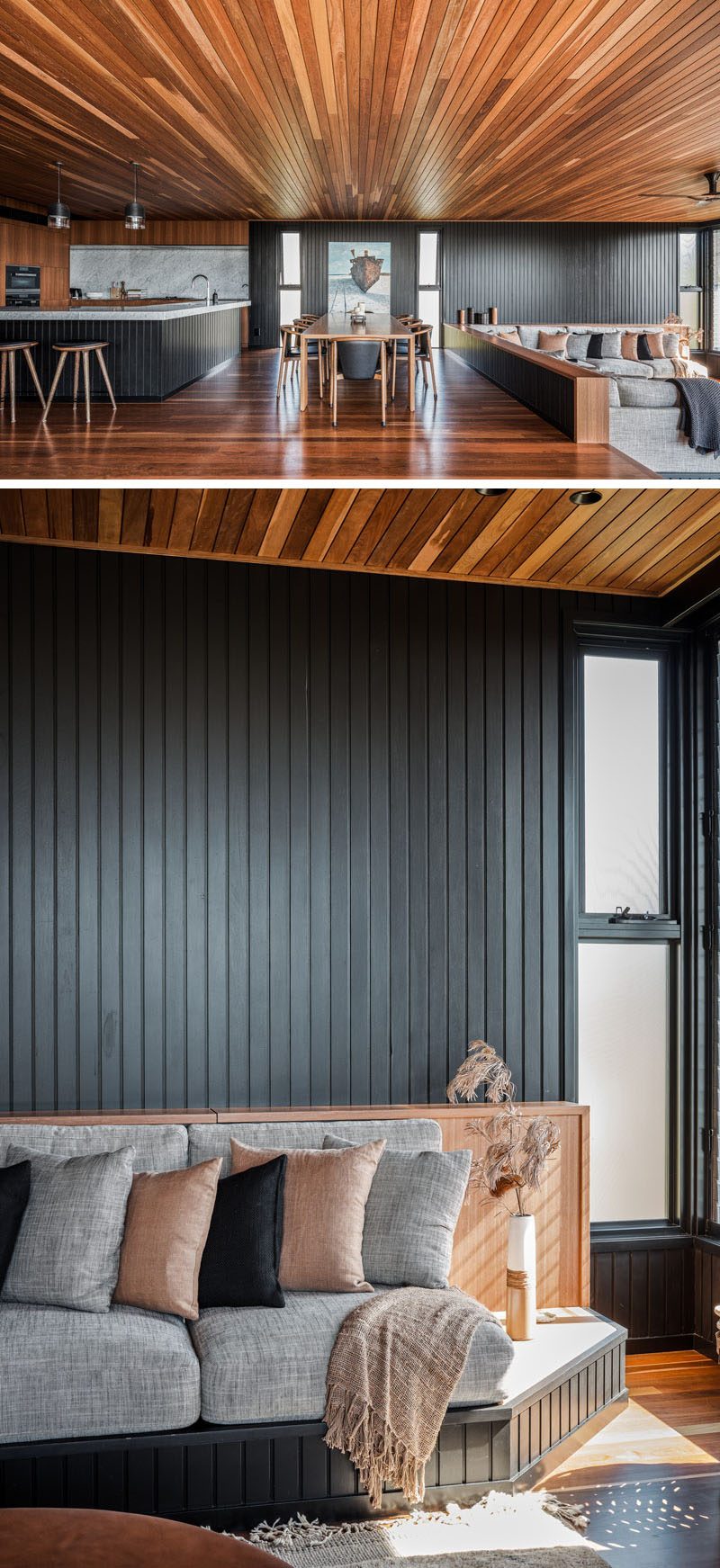 This modern house interior has an open plan kitchen, dining, and living area, where the sunken living room has a custom couch designed to fit the room. #SunkenLivingRoom #CustomCouch #WoodCeiling #WoodFloors
