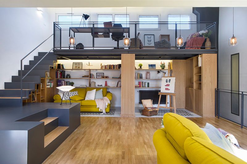 Design firm Egue y Seta, has recently completed an attic renovation that includes a living room and mezzanine with a home office. #AtticRenovation #InteriorDesign #ModernInterior