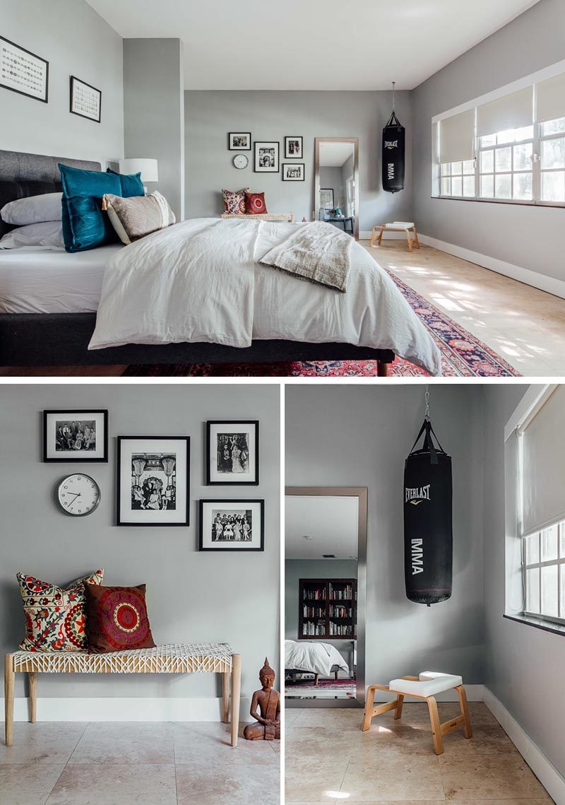 This contemporary guest room has grey walls, a punching bag that hangs from the ceiling, and a tiled floor. #GuestRoom #GuestBedroom