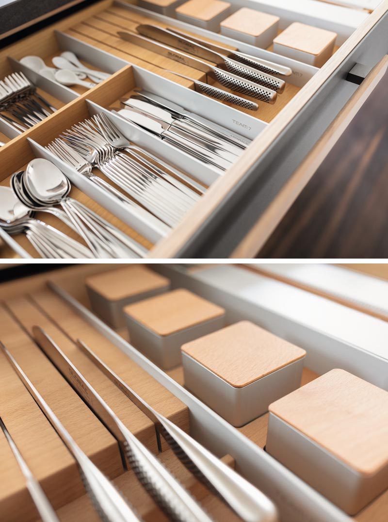 Kitchen Organization Ideas - This modern and modular drawer design combines removable trays, inserts, dividers, knife blocks, spice jars, and foil rolls that can be configured individually. A special solid-wood chopping board can also be integrated into the  drawer fittings. #KitchenOrganization #KitchenDrawerDesign #KitchenDesign