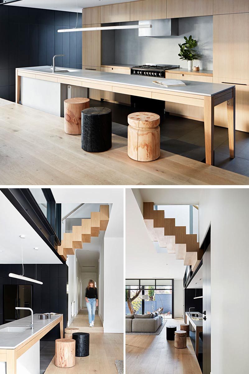 As this kitchen island is slightly stepped down, the designers decided to furnish the island with smaller wood stools. By using short stools, they can be moved easily to other areas of the house where they can double as side tables or extra seating. #KitchenIslandIdeas #KitchenIslandDesign #KitchenIslandStools #KitchenIslandSeating