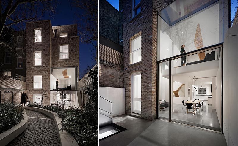 From the garden, you can see the rear of this British house, and the large windows of the dining room and sitting room above. #Windows #Architecture