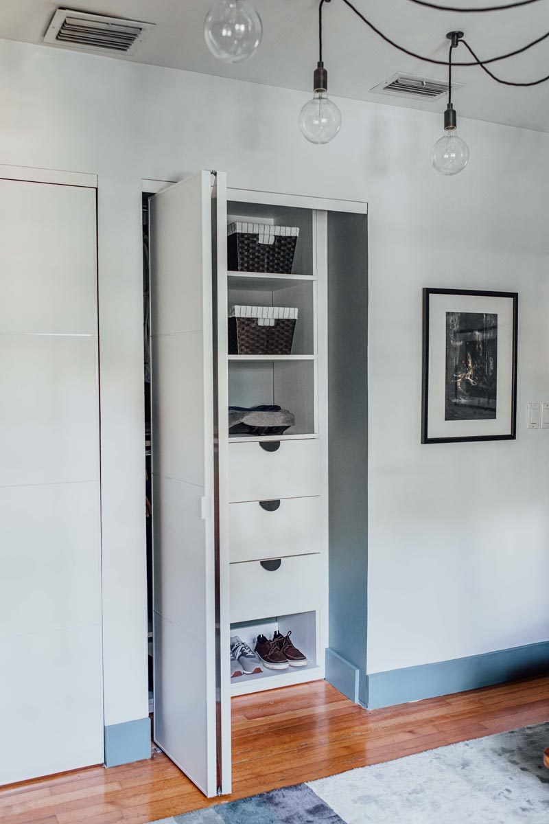 Storage Ideas - Custom shelving and drawers have been added to this modern closet for organized storage. #Closet #StorageIdeas