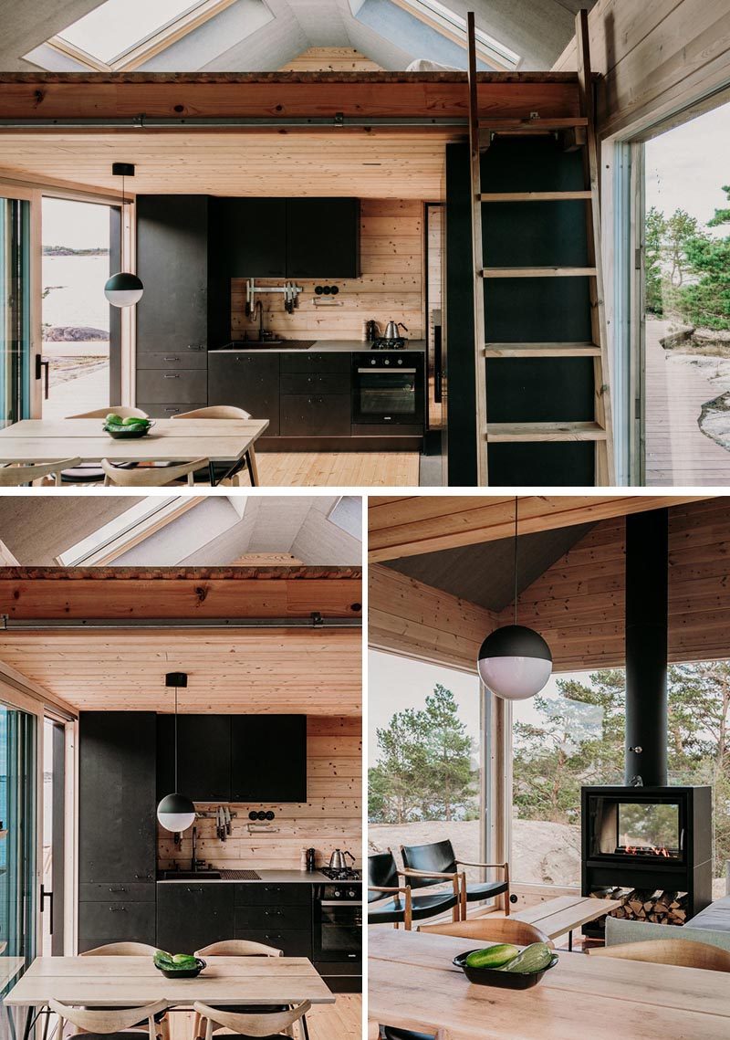 Inside this modern holiday cabin, there's a matte black kitchen and living room that also has a lofted sleeping area. The cabins allow for 10 adults to sleep comfortably, if needed. #Cabin #ModernCabin #BlackKitchen #Loft