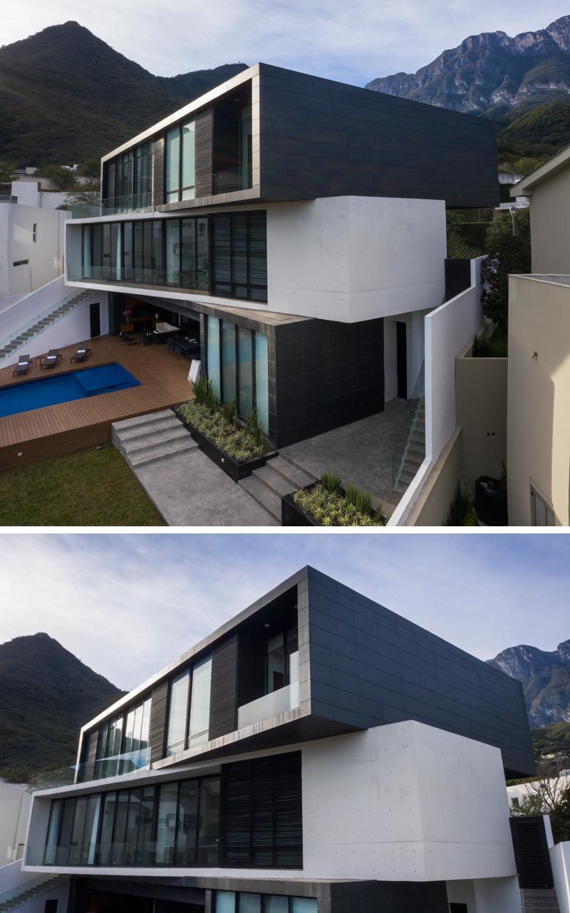 The three rectangular volumes have been rotated and shifted to create a more angled appearance for this modern house, with the lighter middle section separating the two darker levels. #ModernArchitecture #ModernHouse #HouseDesign #Balconies