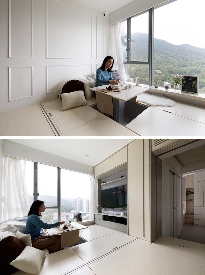 Hidden within the floor of this living room is a dining table that can be raised when needed. There's also small hand holes that can open panels to reveal storage. #HiddenDiningTable #SmallApartment #ApartmentDesign