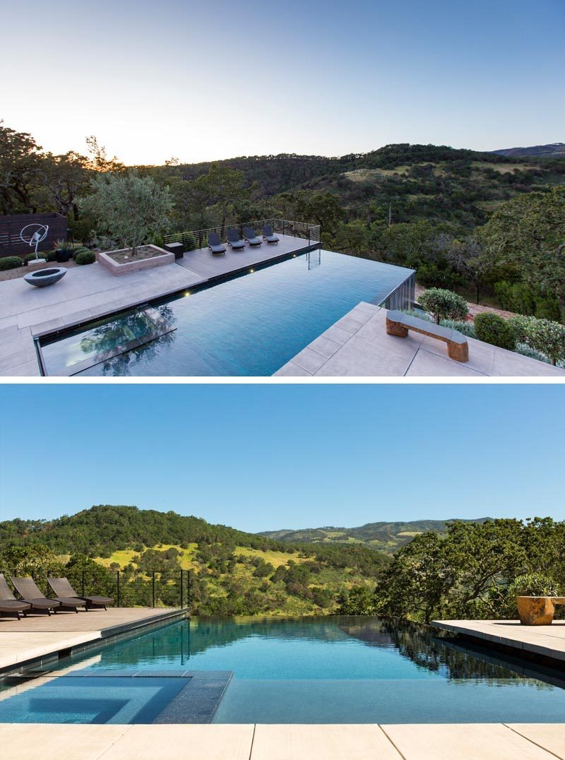 This modern house has a swimming pool with an infinity edge that overlooks the valley. #SwimmingPool #OutdoorSpace