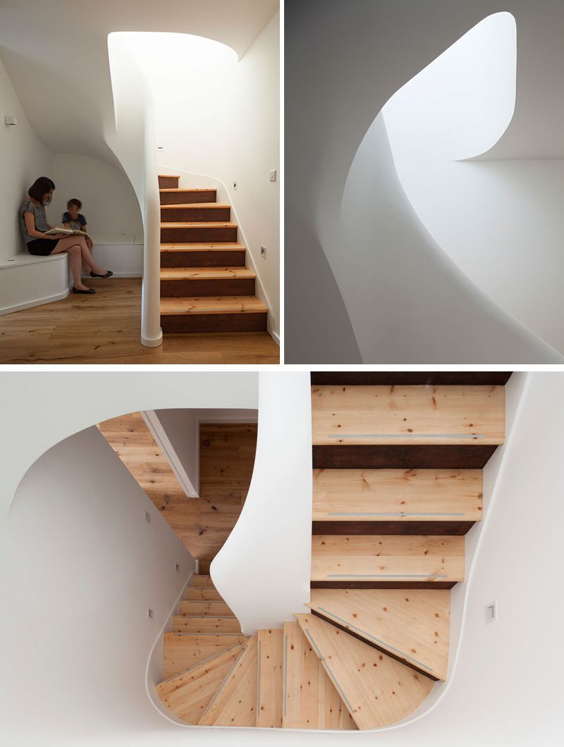 A sculptural staircase leads from the two bedroom ground level flat up to a modern two-storey roof extension. #Stairs #ModernStairs #StairDesign
