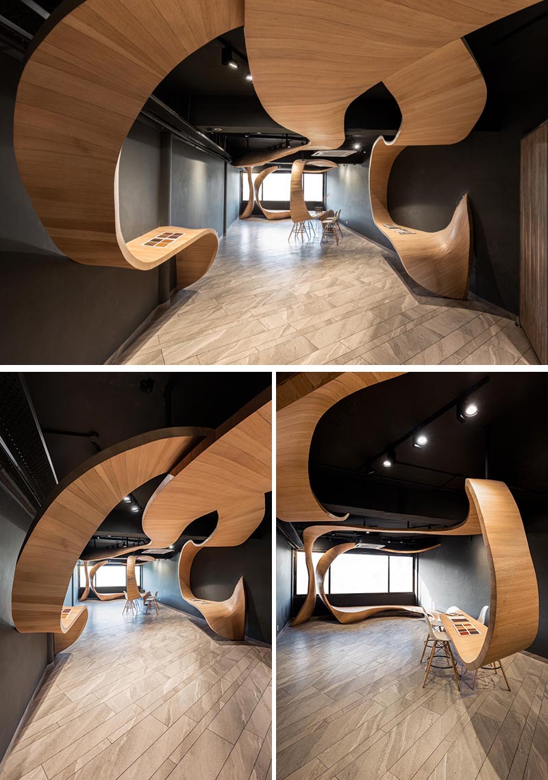 Studio Ardete has designed a ribbon-like sculptural wood installation for their client who sells veneers and plywood. #Wood #Design #RetailDesign