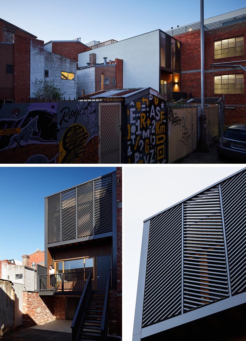 Diagonal black screens add interest to rear facade of this apartment, while steps lead from the laneway up to the front door. #BlackScreens #Architecture