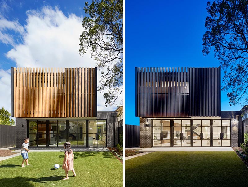 The rear extension features an upper facade of vertical timber battens which provide a visual warmth, as well as provide privacy to the upstairs master bedroom. #ModernExtension #Cantilever #ModernHouse #WoodFacade