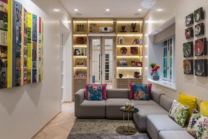 Shelving Idea - Add custom shelving that wraps around the doorway, increasing storage space and adding ambient light with hidden lighting. #ShelvingIdea #WrapAroundShelving #InteriorDesign