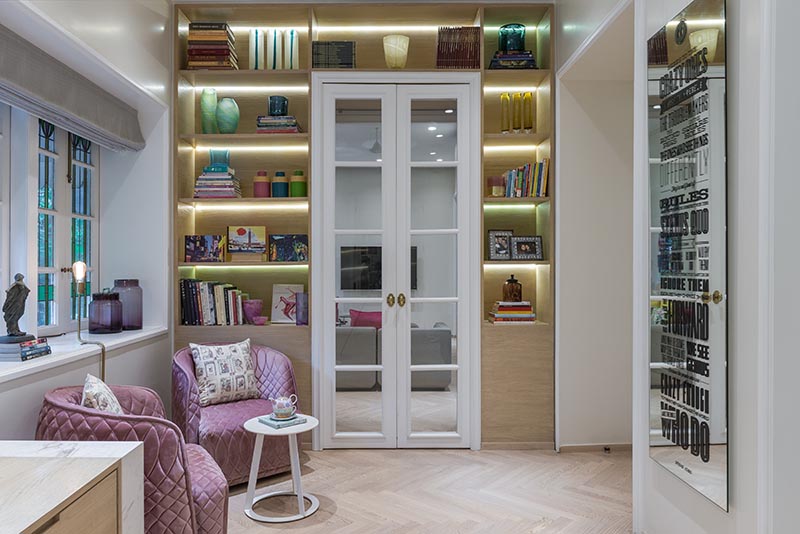 Shelving Idea - Add custom shelving that wraps around the doorway, increasing storage space and adding ambient light with hidden lighting. #ShelvingIdea #WrapAroundShelving #InteriorDesign