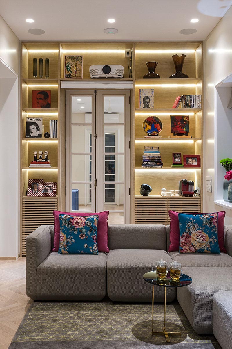 Shelving Idea - Add custom shelving that wraps around the doorway, increasing storage space and adding ambient light with hidden lighting. #ShelvingIdea #WrapAroundShelving #InteriorDesign