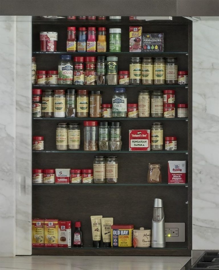 A Hidden Spice Rack Keeps This Kitchen Uncluttered But Always Ready For