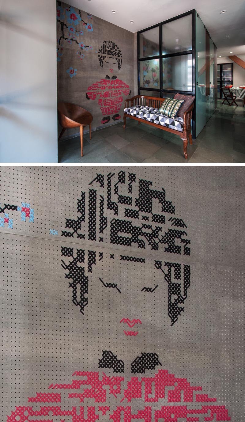 When bespoke studio MuseLAB was tasked with designing an interior for a boutique in busy Bhendi Bazaar, they decided to add colorful embroidered walls. #CrossStich #WallArt #EmbroideredArt #EmbroideredWall #CrossStitchWall #OfficeDesign #RetailDesign