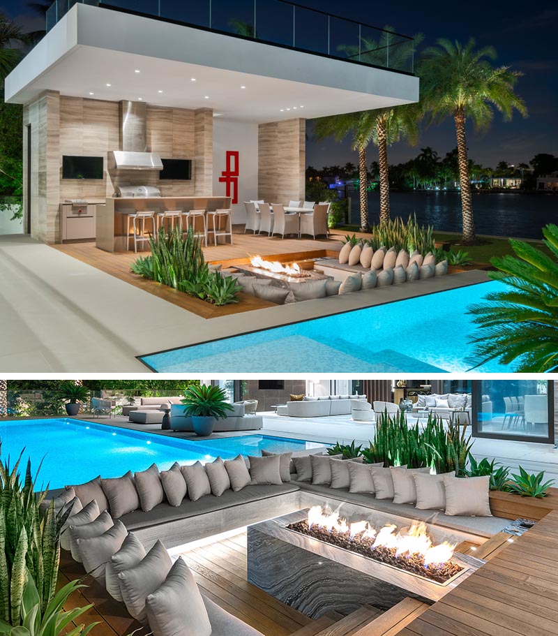 This outdoor sunken lounge has steps that lead down to wrap around bench seating with hidden lighting, and a firepit. #SunkenLounge #Landscaping #OutdoorSeating