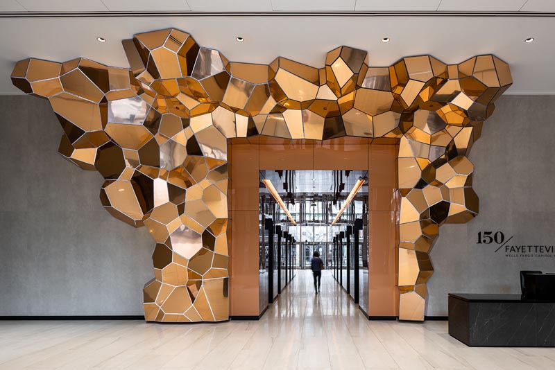 The form of 'Grotta Aeris' was inspired by the crystalline growth of natural elements, and to achieve that look, SOFTlab created the structure in copper-finished composite panels. #Sculpture #Art #Design