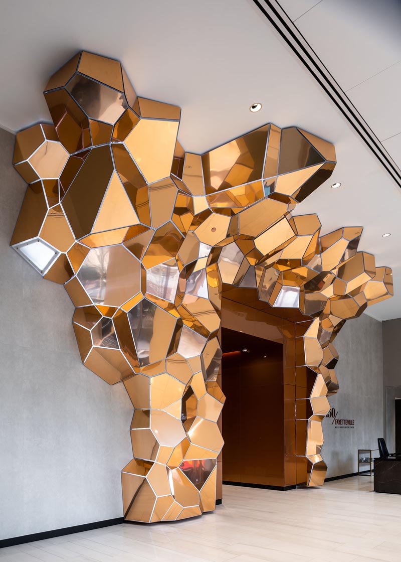 The form of  'Grotta Aeris' was inspired by the crystalline growth of natural elements, and to achieve that look, SOFTlab created the structure in copper-finished composite panels. #Sculpture #Art #Design