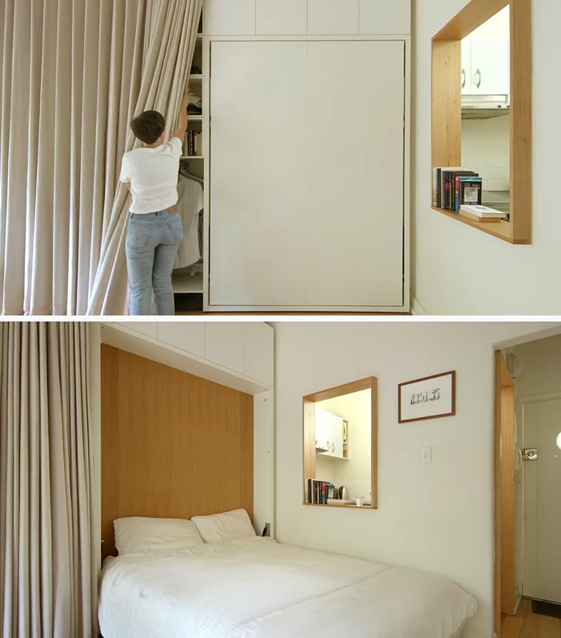 At the end of the storage wall in this micro apartment is a fold down bed. This allows for the openness of the apartment to be enjoyed throughout the day without the bed being in the way. Above the bed more cabinets for storage. #MicroApartment #MurphyBed #FoldDownBed #Small Apartment