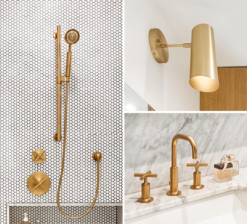 The brass fixtures throughout this modern bathroom, like in the shower, the lighting and faucets, add a metallic touch of glamor. #BrassBathroomFixtures #BrassFixtures #ModernBathroom