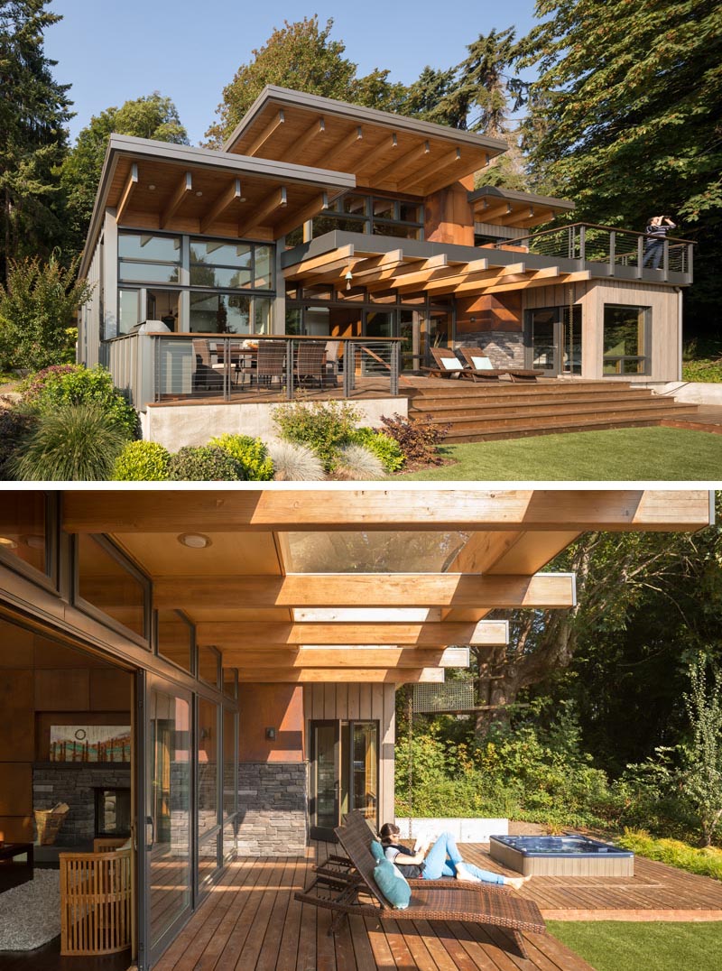 The social areas of this Pacific-Northwest house open up to a deck with an outdoor dining space and hot tub.  #ModernArchitecture #PacificNorthwestArchitecture #OutdoorSpace