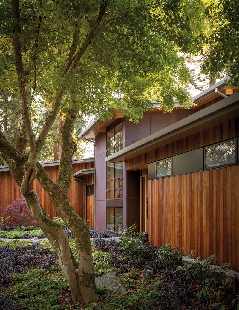 Weathering steel and ipe wood siding are featured on this modern house.