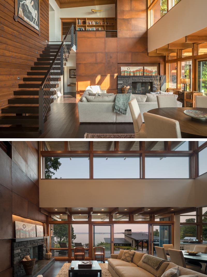 A stone mass wall with corten panels provides the focal point of the living space, housing a fireplace and media center while providing separation from the master suite. #ModernLivingRoom #CortenSteel #Fireplace