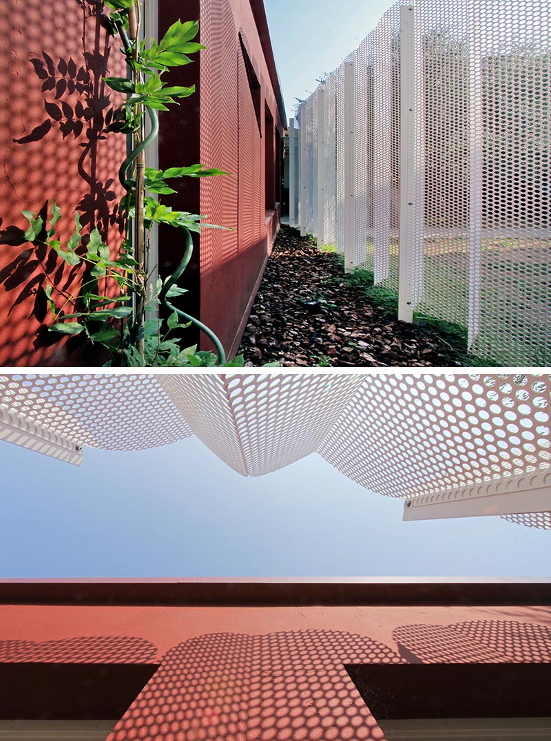 Architect and designer Francesca Perani has created a micro-apartment in Bergamo, Italy, that features a perforated metal screened facade. #MetalScreen #PrivacyScreen #Architecture #BuildingDesign