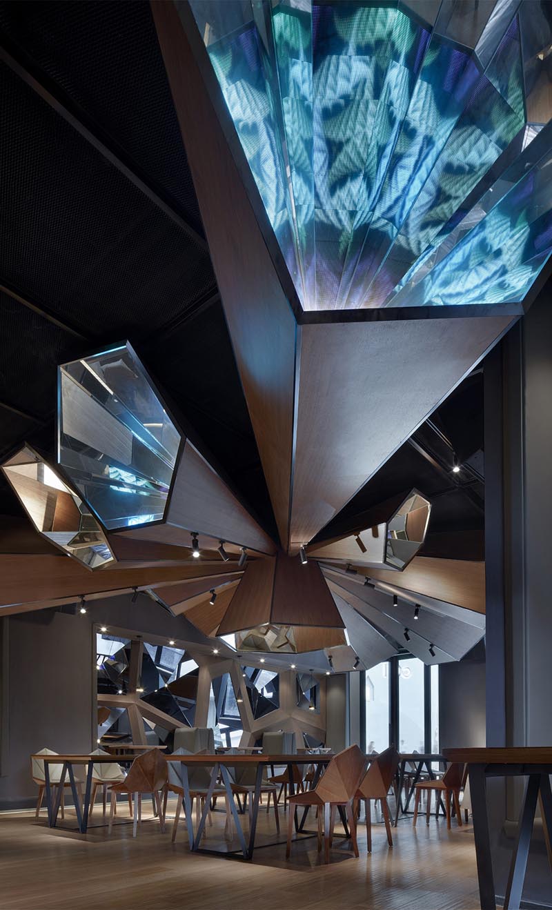 A modern restaurant with ceiling accent. #ModernRestaurant