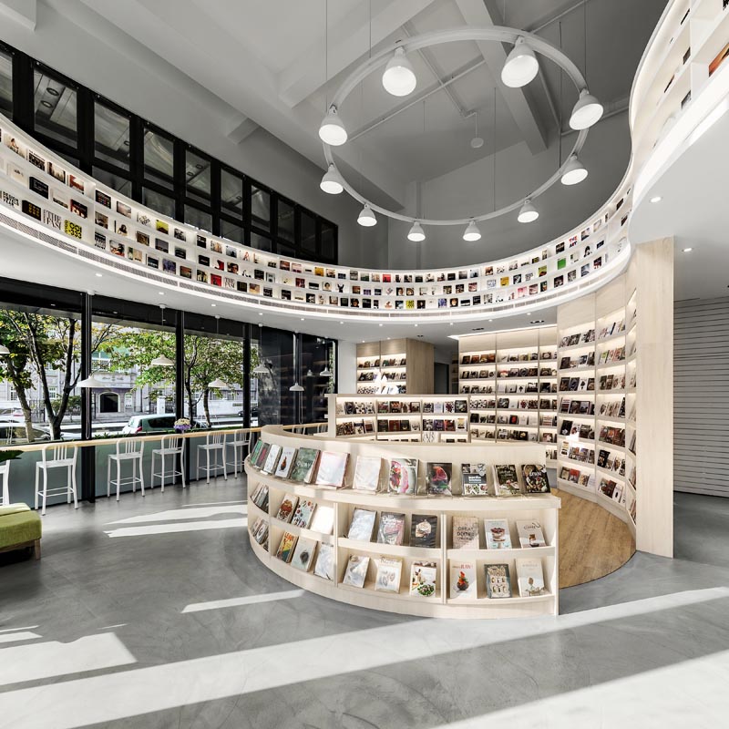 A modern library with circular shelving. #LibraryDesign