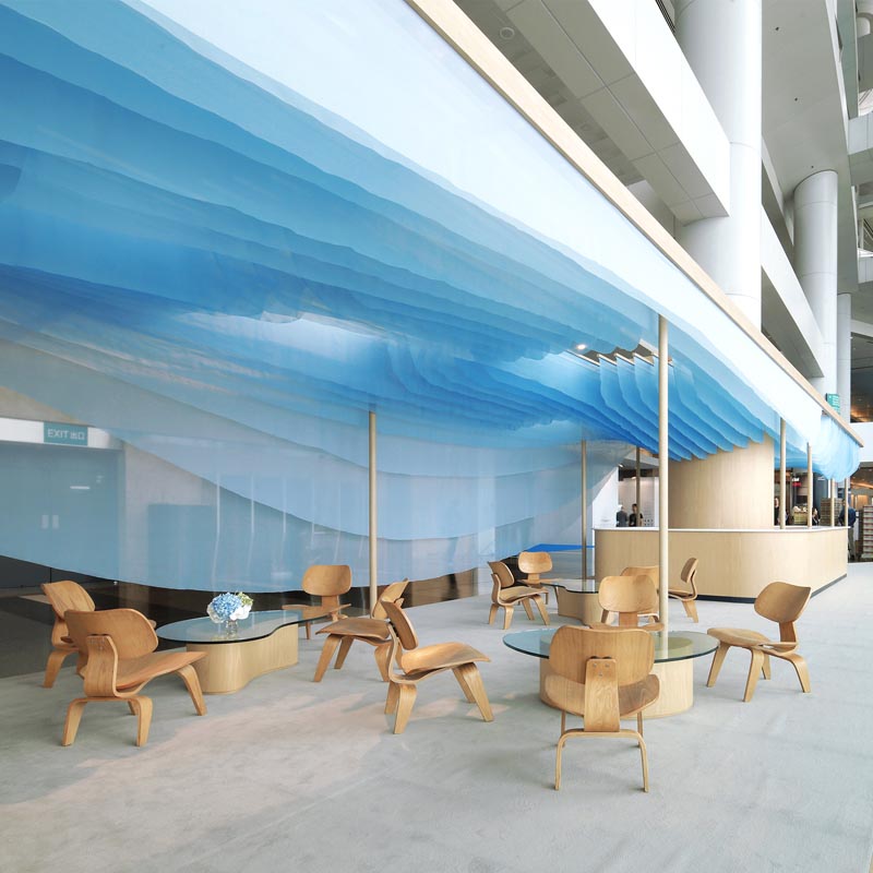 A modern pavilion with a blue cloud-like design. #Design #Architecture