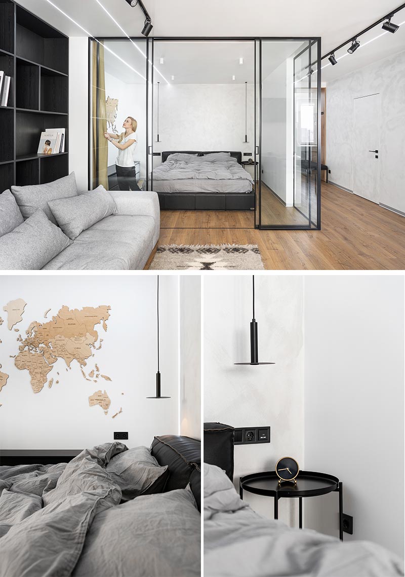 Located directly off the living room of this modern apartment, is a glass enclosed bedroom that provides separation from the rest of the apartment, but at the same time allows the natural light from the window to travel through to the bedroom. #GlassEnclosedBedroom #ModernApartment #BedroomDesign