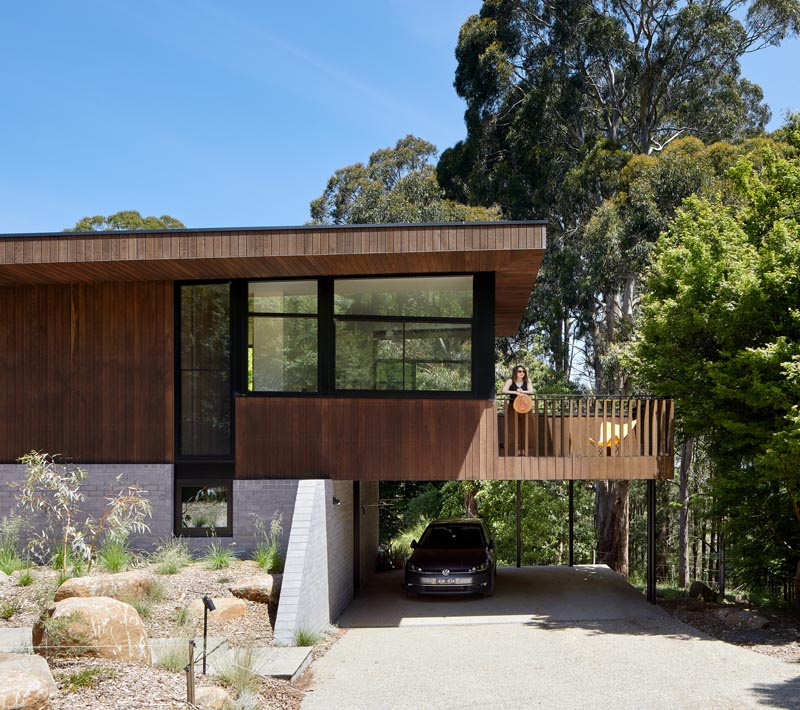 BENT Architecture has designed a split-level house in Melbourne, Australia, that has an angled roof, and uses locally-sourced Ironbark and Timbercrete blockwork. #ModernHouse #ModernArchitecture #Timbercrete #AngledRoof